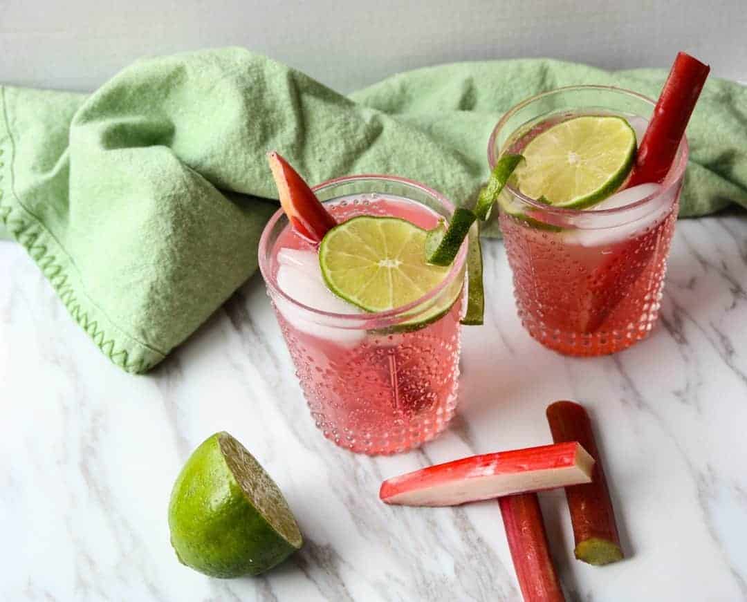 Two drinks in glasses on a table